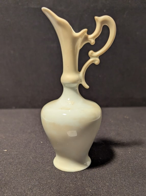 Antique Limoges France Porcelain Ewer - Miniature: Antique Limoges France Porcelain Ewer - Miniature. Stamped on bottom. Gout de Villa, Limoges, France. Delicate design. Near mint condition. Meas. 6"h x 3"w.