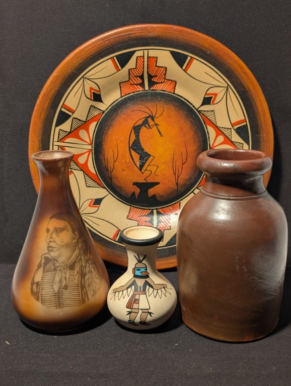 Native American Pottery Group - Hopi Toad: Native American Pottery Grouping includes a handpainted charger w/ Kokopelli figure and geometric design with molded hanging hole on reverse (meas. 1'h x 12"r)., a milk crock w/ brown glaze (meas.