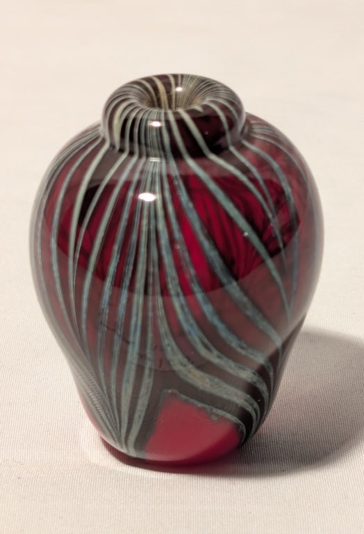 Rare L. E. Smith Ruby Miniature Bud Vase -Signed: Rare L. E. Smith Ruby Miniature Bud Vase - Signed on Bottom Smith, A-865, 4/15. Design is a metallic steel colored drip on ruby red base. Mint condition. Meas. 2"h x 2"r.