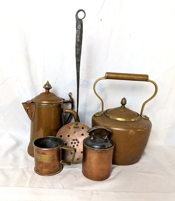 dVtg Copper Coffee & Tea Collection: Vtg Copper Coffee & Tea Collection. Includes copper teapot w/ brass hardware and wooden handle. Meas. 10"h x 11"w x 7"d. Copper coffee pot has brass final, rim and handle and meas. 8 3/4"h x 4 1/2"r C
