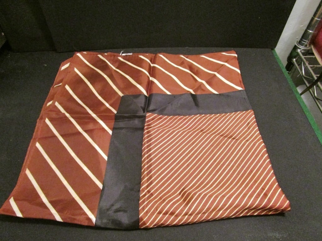 100% Acetate Scarf Japan Stripe Design: 100% Acetate Scarf Japan Stripe Design. Brown, cream, black strip design. Meas 27"sq.