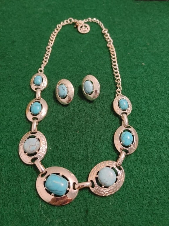 Trifari SP Turquoise Necklace & Earring Set: Trifari SP Turquoise Necklace & Earring Set. Turquoise beads set in silver plate. Adj length lobster claw clasp. Slight wear on clasp. Meas 9"l. Matching clip-on earrings meas 1". Very nice unique set