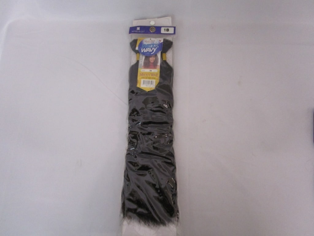 Shake N' Go Hair Extensions Color 1B: Wet & Wavy hair extension kit by Shake N' Go. Wig is made from 100% human hair and is the milky way (1B) color. Item is in brand new condition; it has never been taken out of the packaging