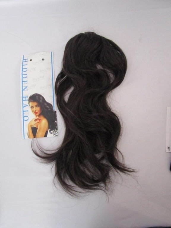 Hidden Halo Hair Extensions: Includes one clip-in hair extension by Hidden Halo. Clips are included. Hair is made from 100% premium synthetic fiber and is in a dark brown color. Item is in gently used condition and comes with the
