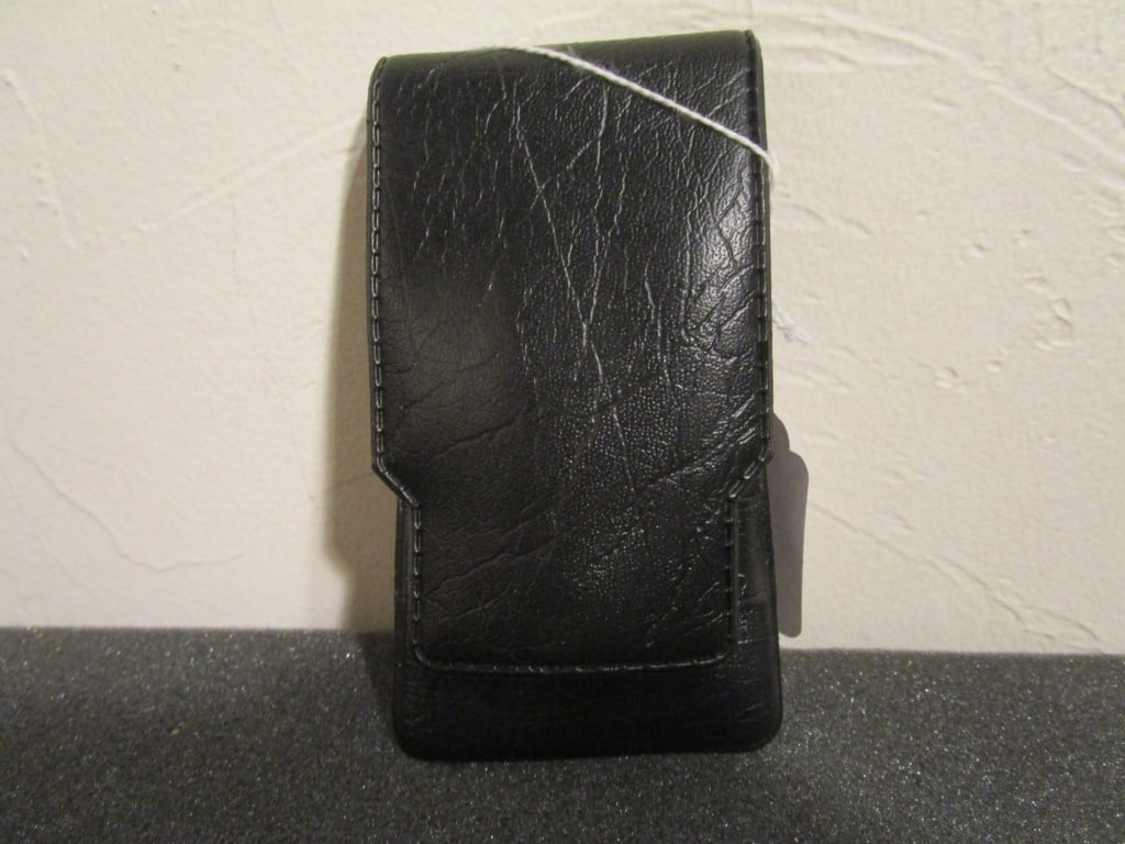 Oleg Cassini Nail Care Kit in Leather Pouch: Vtg Oleg Cassini Nail Care Kit in Leather Pouch. Comb, nail file, 2 nail clippers. Like new. Meas. 5"h x 3"w x 1"d.