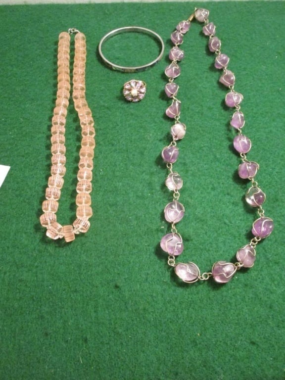Jewelry Grouping Incl. Wire Wrap Amethyst Necklace: Jewelry Grouping - 2 Necklaces, Bracelet, Ring. 1 necklace has glass beads with pink undertones, silverplated clasp, meas 10 1/2"l. 1 necklace is wire wrapped art deco amethyst stones, meas 13"l. Gold