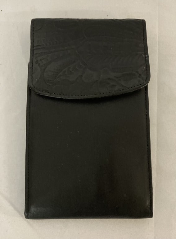 Vtg Rolf's Macro Bag Cowhide Wallet: Vtg Rolf's Macro Bag Cowhide Wallet. Black western style floral embossed exterior pouch. 3 panel interior w/ various pouches, credit card, driver's license and zippered pouch. Bill fold wallet. Snap c