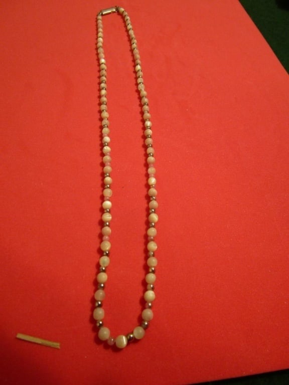 Necklace w/ Miniature Pearls: Necklace w/ real miniature pearls, pink and gold plated bead separators. Meas 10". Pearls have varied coloring.
