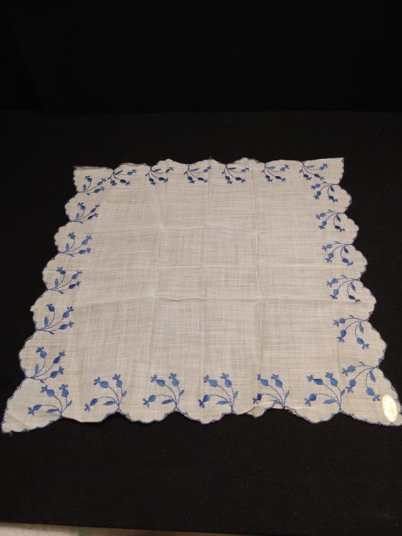 Vtg Cotton Accent Scarf Hanky Switzerland: Vtg Cotton Accent Scarf Hanky Switzerland. Scalloped edge, blue embroidered flowers. 11"sq.