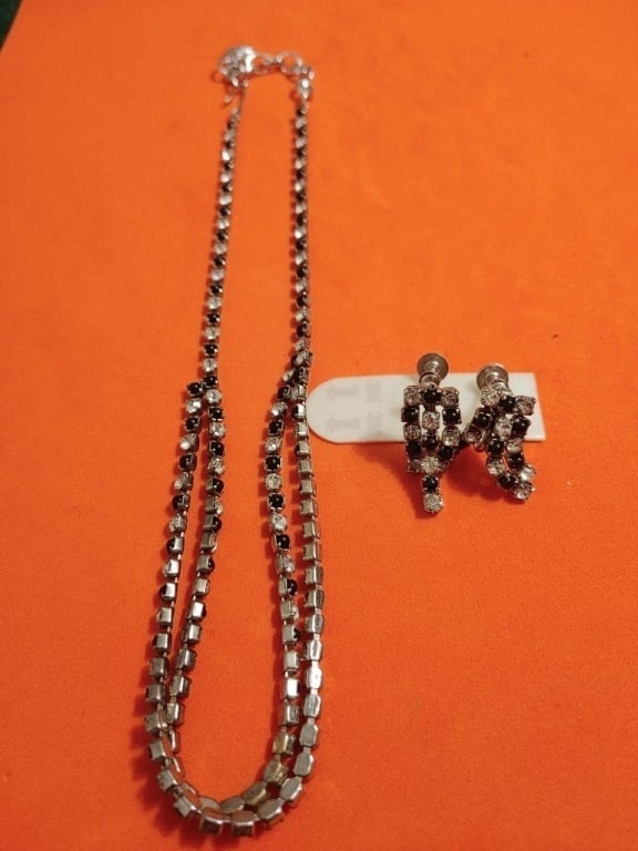 SP Necklace & Earring Set - CZ & Onyx: Silverplated necklace and earring set. Necklace has double strand (half way) of onyx and cubic zirconia stones, fish hook closure, meas 8"l. Earrings have 3 dangling strands with varying lengths, scre