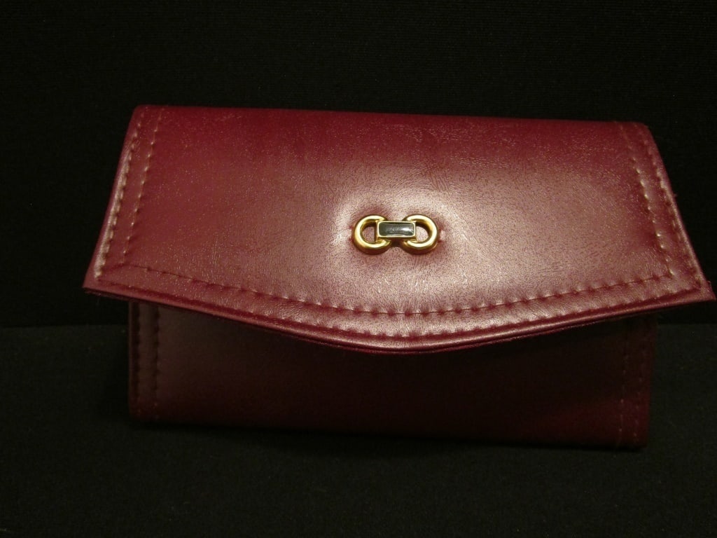 Vtg Red Leather Clutch / Wallet w/ Calculator: Vtg Red Leather Clutch / Wallet included interior calculator, checkbook cover, credit card sleeves, billfold, picture / credit card holder, calculator instructions. brass hardware. Meas 7"w x 4 1/2"h 