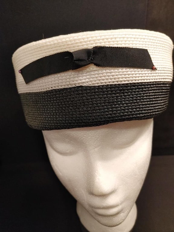 1940s Union Made Black/White Hat: 1940s Union Made Black/White Hat. Alternating Bands of black and white. Front black bow. white top. Mint condition, all in tact. Meas. 7"r x 3 1/2"h.