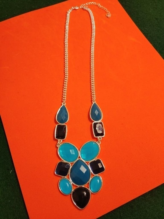 Vtg Art Deco Geometric Design Necklace: Vintage Art Deco Geometric Design Necklace. Set in sterling silver, gems are in various shapes of blue. Bevel is diamond shaped. Meas 11 1/2".