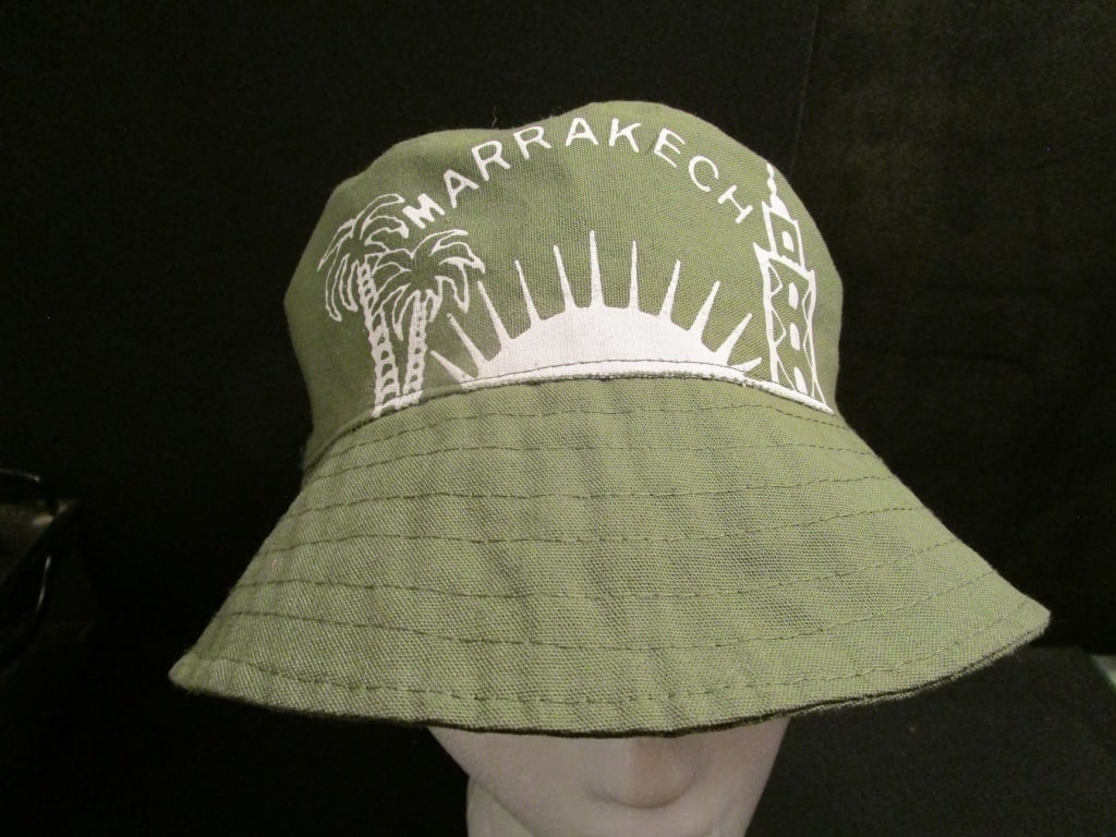 1990s Marrakech Safari Bucket Hat: 1990s Marrakech Safari Bucket Hat. Collapsible w/ air holes at top. Ribbed brim. Mint condition. Meas. 7 1/2"h x 11"r.