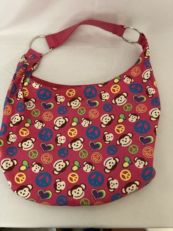 Monkey/Peace Sign Shoulder Bag: Monkey / Peace Sign Shoulder Bag. May be Paul Frank but no label - not verified. Pink cotton bag w/ pink leather shoulder strap. Chrome accents. 2 interior pouches, 1 zippered pocket. Like new