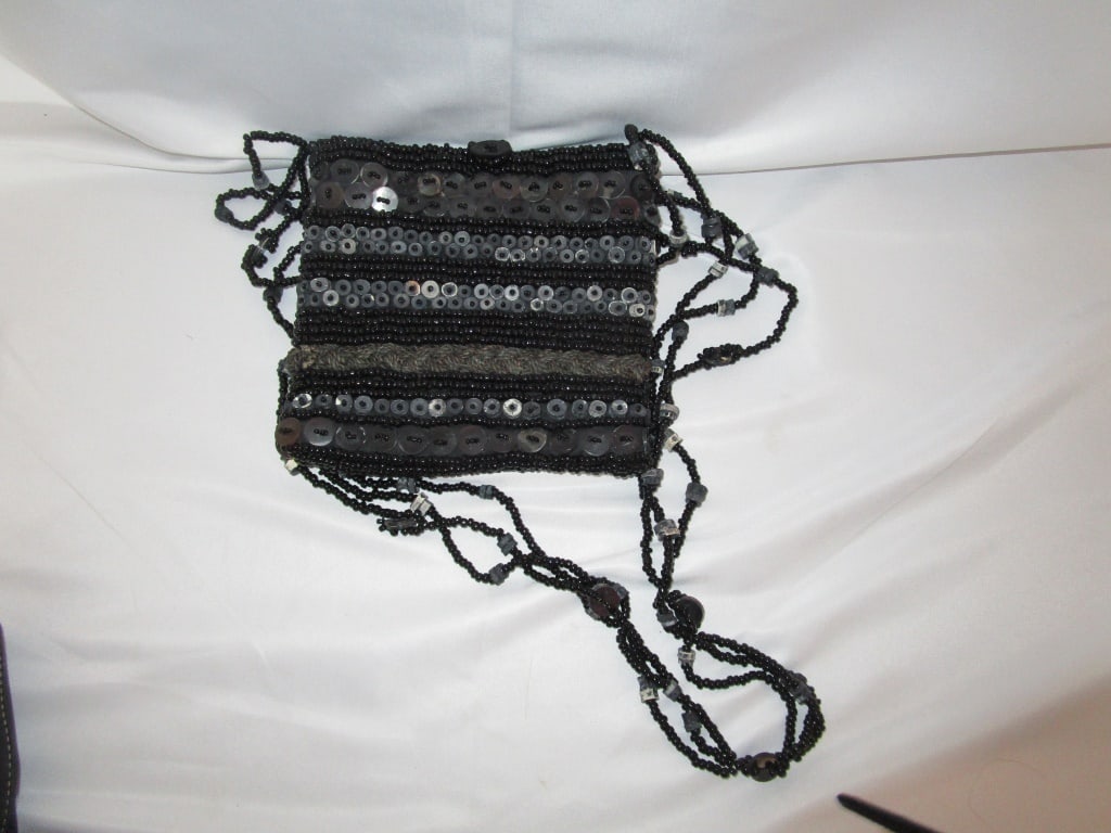 Vtg Mali Parmi Black Beaded Cross Body Bag: Vtg Mali Parmi Black Beaded Cross Body Bag. Beautiful bead work, Beaded loop closure, Triple twisted beaded strap. Horizontal varied bead and thread work design. No visible loss of beads. Very