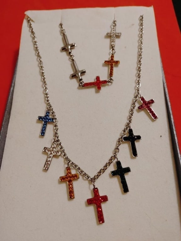 Sterling Cross Necklace & Bracelet Set: Sterling Cross Necklace & Bracelet Set. Varying rhinestone crosses set in sterling silver. Chain is 10"l. Bracelet is 7"l. Nice condition.