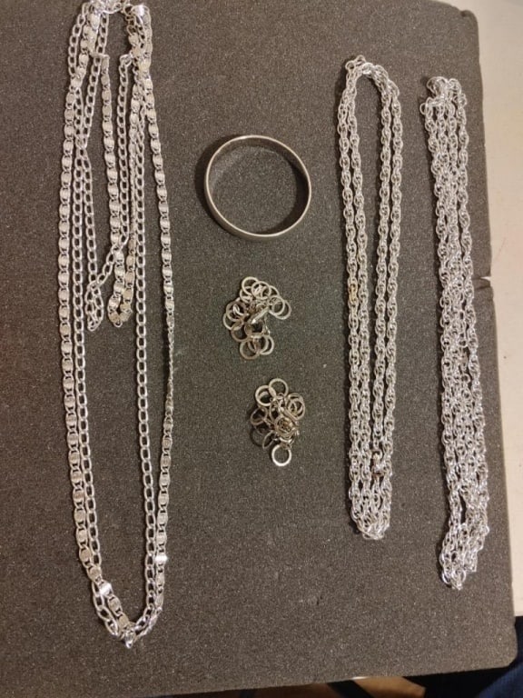 Silver Tone Necklace Bangle & Earring Grouping #4: Silver Tone Necklace Bangle & Earring Grouping. A bangle, a set of earring, 3 necklaces - measuring 17", 15", 13".