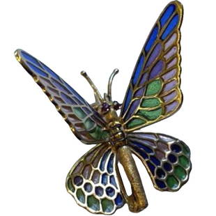 Butterfly Plique a Jour Pin - Adjustable Wings: 18kt. Yellow gold, stamped. Plique a Jour Moveable Butterfly Pin. Measures 1.5" in length. Blue, green, pink, violet enamel. Stamped Spain. Pin weighs 5.50 grams. **Shipping on this item offered