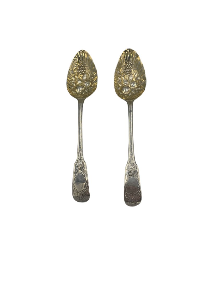 2 Robert Rutland Sterling Georgian Berry Spoons: A pair of sterling Georgian berry spoons by Robert Rutland Silver. Both measure about 9 inches long. Entire lot weighs 3.6 ounces.
