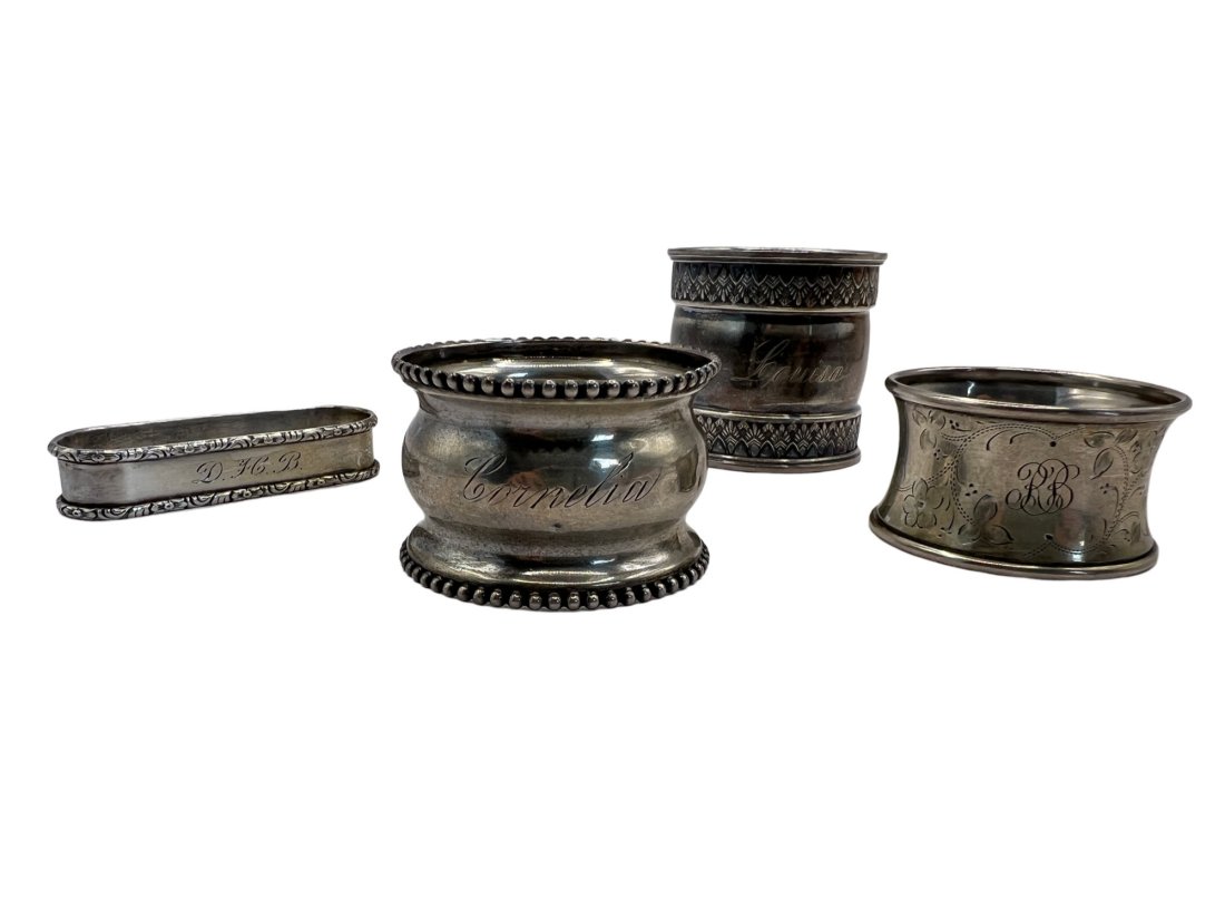 Sterling Napkin Rings Lot: Lot of sterling monogrammed napkin rings. Ranging in size. **Shipping on this item offered through, UPS (843) 203-3466 store7194@theupsstore.com, Pak Mail 843-849-0310 - info@charlestonshipping.com or
