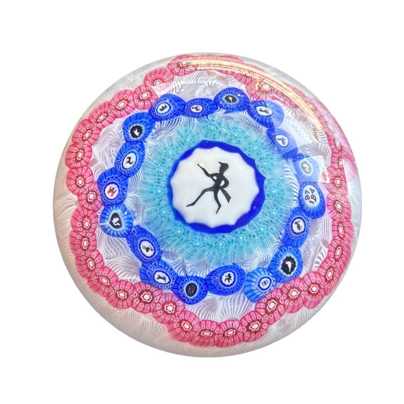 Vintage Baccarat Millefiori Gridel Glass Paperweight With Box: VINTAGE BACCARAT MILLEFIORI GRIDEL GLASS PAPERWEIGHT, with central large black and white hunter silhouette cane, surrounded by a single ring of blue, concave medial ring of silhouette canes including 
