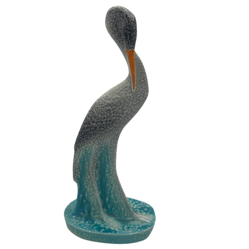 N.V. Koninklyke Plateelbakkery Zuid Holland Gouda Rare Aqua Black Stork Figurine: Vintage 1930's Gouda NV Koninklyke Plateelbakkery Zuid Holland abstract stork/crane figurine. This piece has an impressed AV monogram from the artist & is stamped on the underside of the base. The fig