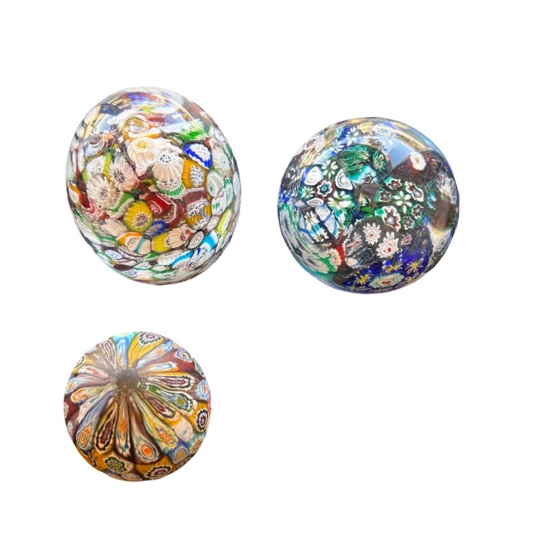 Lot Of Murano paperweights: this lot is full of beautiful Murano glass paperweights larger egg circumference 8" height 3 1/2" smaller egg circumference 6 1/4" Height 3"l arger round circumference 9" height 2"s **SHIPPING on this