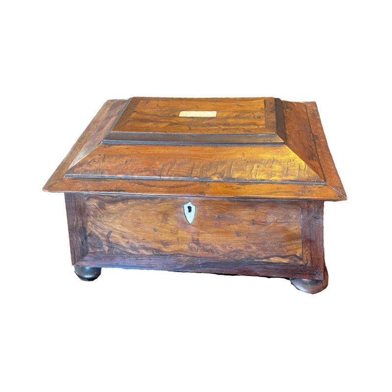 Antique Birlwood Casket Shaped Tea Caddy: Antique Victorian birlwood casket shaped tea caddy, with bone inlay. Measurements: 7”h x 12”l x 8.75”w x 3.75”d