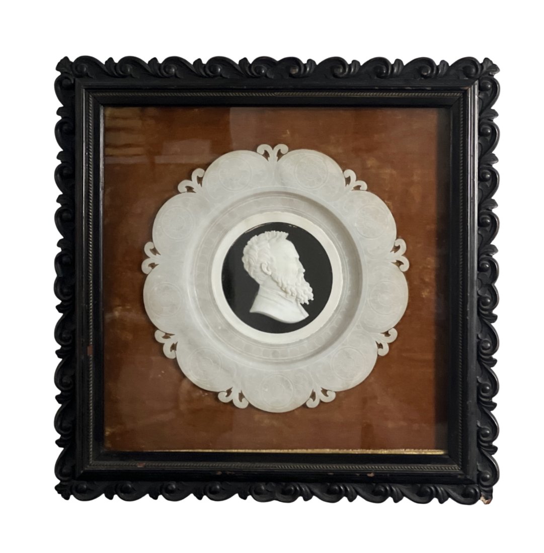 Antique Portrait Bust Carved and Etched Alabaster Michelangelo: Medallion bust of a bearded man Michelangelo on a black background. Orange velvet mat with alabaster decorated with floral motifs. Measurement with frame: 20" x 20"**SHIPPING on this item offered thro