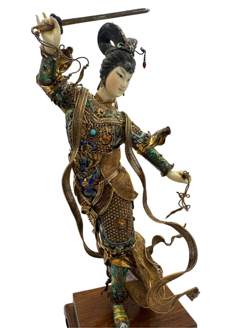 Chinese Gilt Silver Enamel Filigree Warrior Figure: Beautiful and extremely detailed vintage / antique (early to mid 20th century) Chinese woman warrior on a carved wood base.She is adorned in filigree hard mesh armor embellished with turquoise cloison