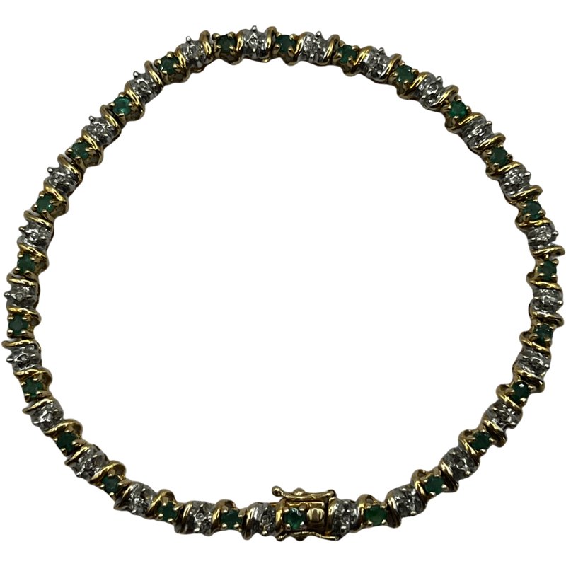 10K Gold Diamond And Emerald Bracelet: Such an amazing piece of jewelry. 10K gold with diamonds and emeralds. 8" Length unclasped. 3.76mm Width. 8.4 grams **In House Shipping