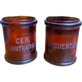 Two Whitall Tatum and Co Apothecary Jars, Amber Colored