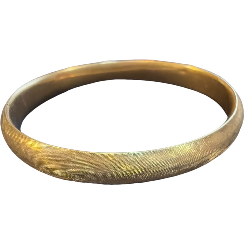 14K Gold Bangle Bracelet: 14K Gold Bangle Bracelet. From the living estate of Lynn Letson Measurements: bracelet size - 6.75" weight: 10.66 grams **IN HOUSE SHIPPING offered on this lot