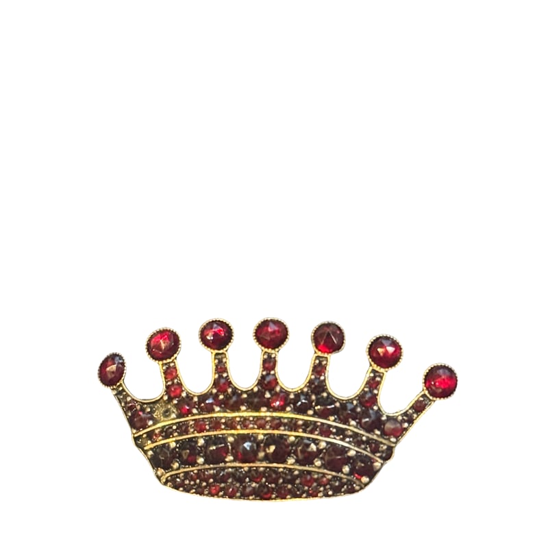 10K Gold Garnet Crown Brooch: Make a bold statement with this stunning 10k gold brooch featuring a regal crown design adorned with deep red garnet stones. Measurements: 40.27mm L. 20.13mm H. Weight: 5.02 grams **IN HOUSE SHIPPING 