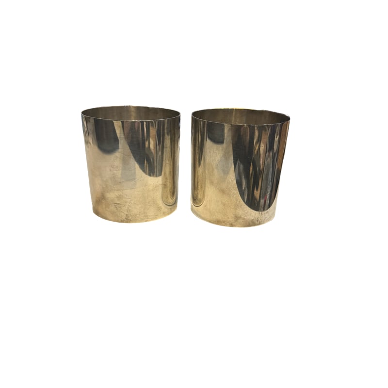 Tiffany and Co Sterling Silver - 25083: Two Tiffany and Co sterling silver - 25083. Measurements: 3.25"H x 10"around Total weight of both: 367.98 grams **IN HOUSE SHIPPING offered on this lot. Each comes with their own Tiffany and Co bag.
