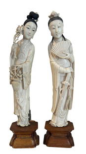 antique Pair Of Chinese Carved Bone ?? Figures Of Maidens: A Pair of Chinese Carved Ivory Figures of Maidens, presented on carved wood stands, height 14" **OUT OF HOUSE SHIPPING on this lot, we recommend Pak Mail 843-849-0310 info@charlestonshipping.com or Po
