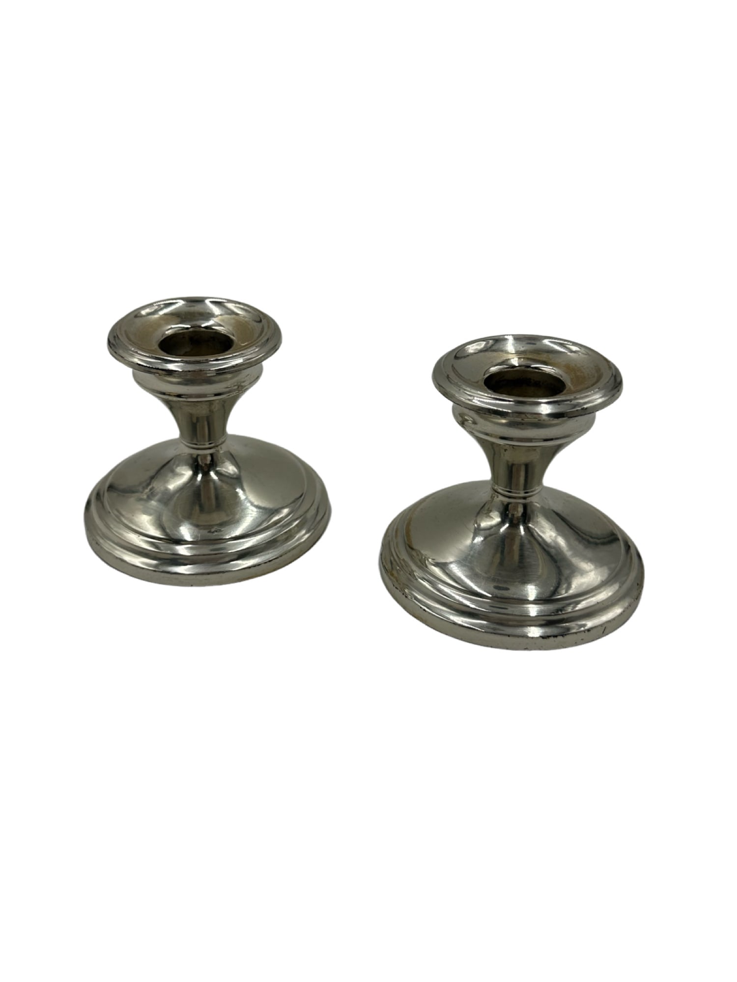 Set of 2 Sterling Silver Reinforced with Cement Candlesticks: Set of 2 Sterling Silver Reinforced with Cement Candlesticks 3 in. H x 2.75 base 234 grams **IN HOUSE SHIPPING WITHIN UNITED STATES