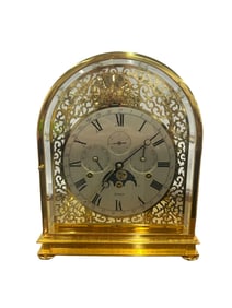 A 2OTH CENTURY KIENINGER GOLD PLATED MOONPHASE TABLE CLOCK