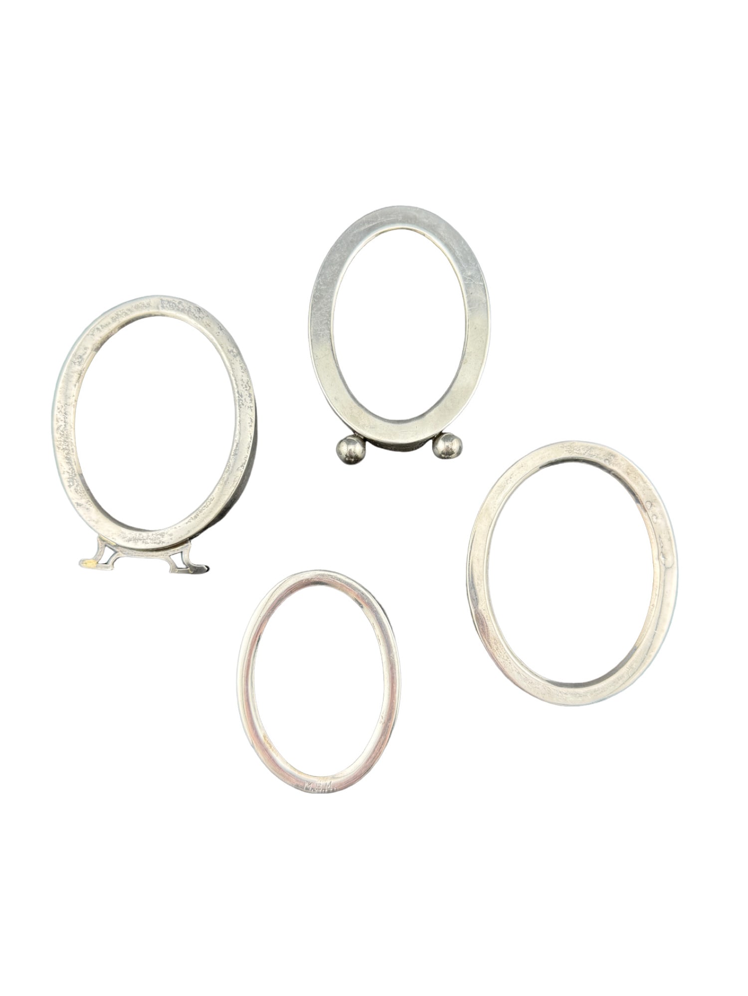 Webster Sterling Silver Set of 4 Small Picture Frames: Sterling Silver Set of 4 Small Picture Frames Two frames come with backing and 2 come with glass All are marked Webster except 1 Frame Measurments 2.5 inches 3 inches 3 inches 3 inches One frame is mo