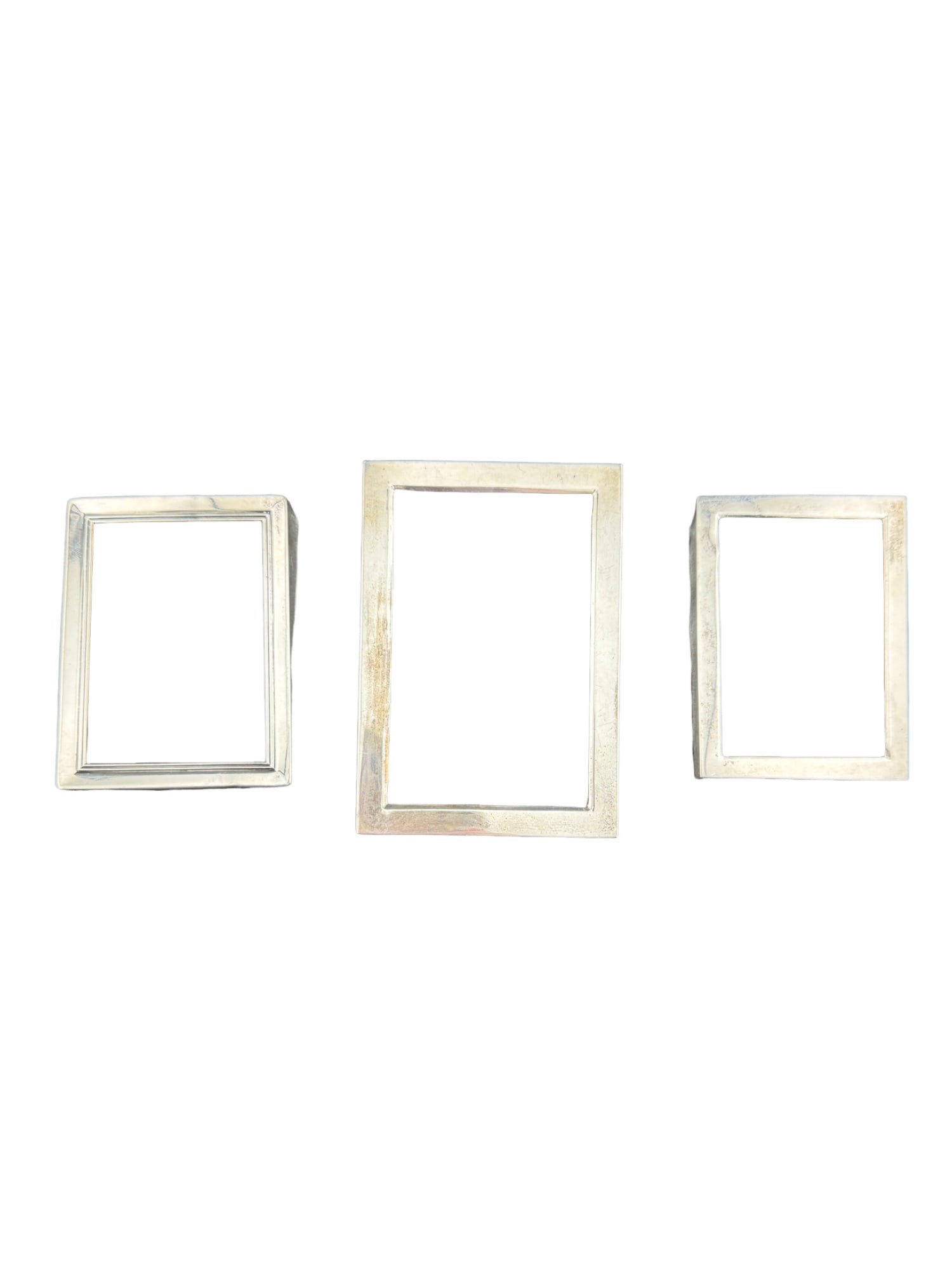 Webster and Lunt Sterling Silver Set of 3 Picture Frames: Webster and Lunt Sterling Silver Set of 3 Picture Frames 2 frames come with backing Frame measurements: 4.5 x 3 inches 3.5 x 2.5 inches 3.5 x 2.5 inches From the estate of Peter and Patti McGee In hou