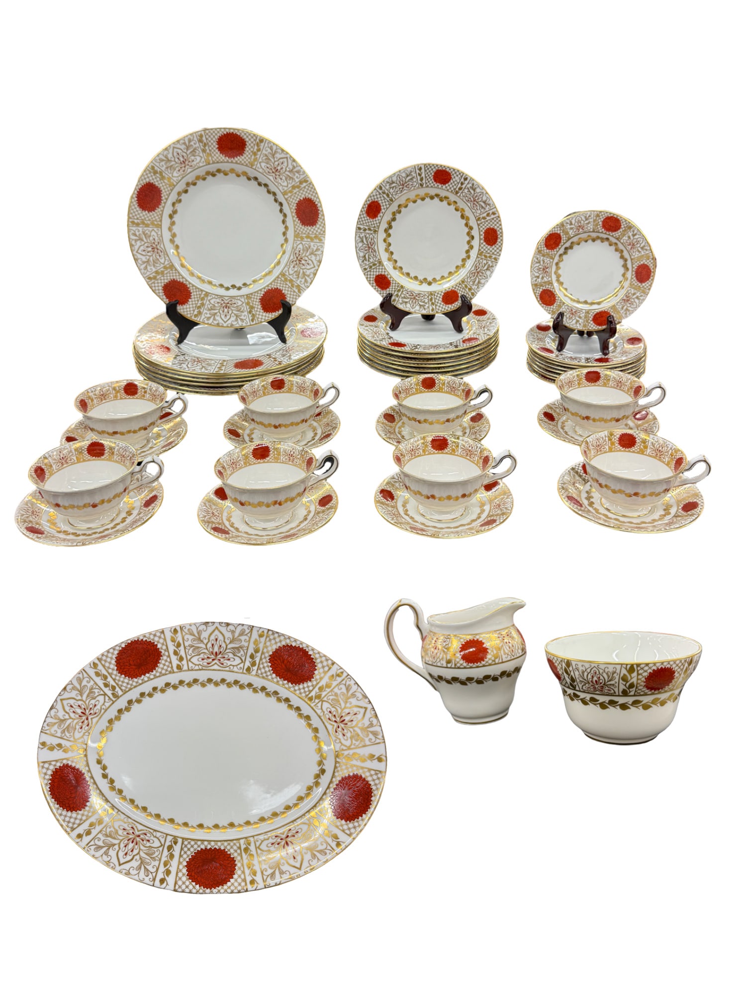 "Empress" Abbeydale Bone China 74 Piece Set from a Charleston Estate: "Empress" Abbeydale Bone China 43 Piece Set Includes 12 large plates, 12 medium plates, 12 small plates, 11 salad bowls, 12 teacup plates, 12 teacups, 1 creamer, 1 compost, and 1 large serving tray. L