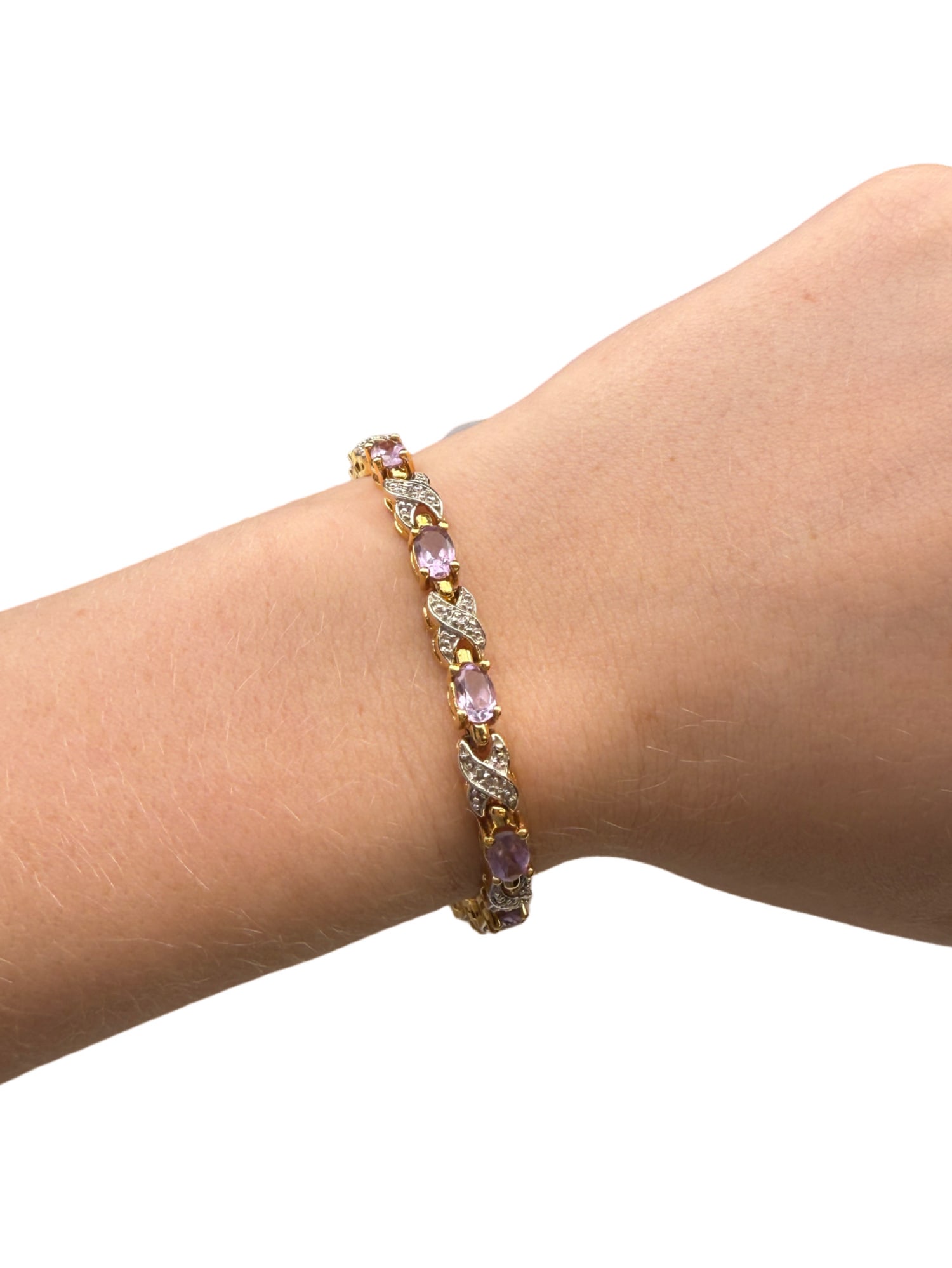 Gold Plated Sterling Silver Amethyst and Diamond Bracelet: Gold Plated Sterling Silver Amethyst and Diamond Bracelet 7.5"L unclasped 15.4 grams Amethyst size: 4.14mm x 5.72mm Diamond size: 1.36mm In house shipping within the US.