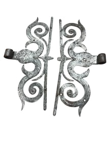 Pair of wrought iron ram's horn hinges