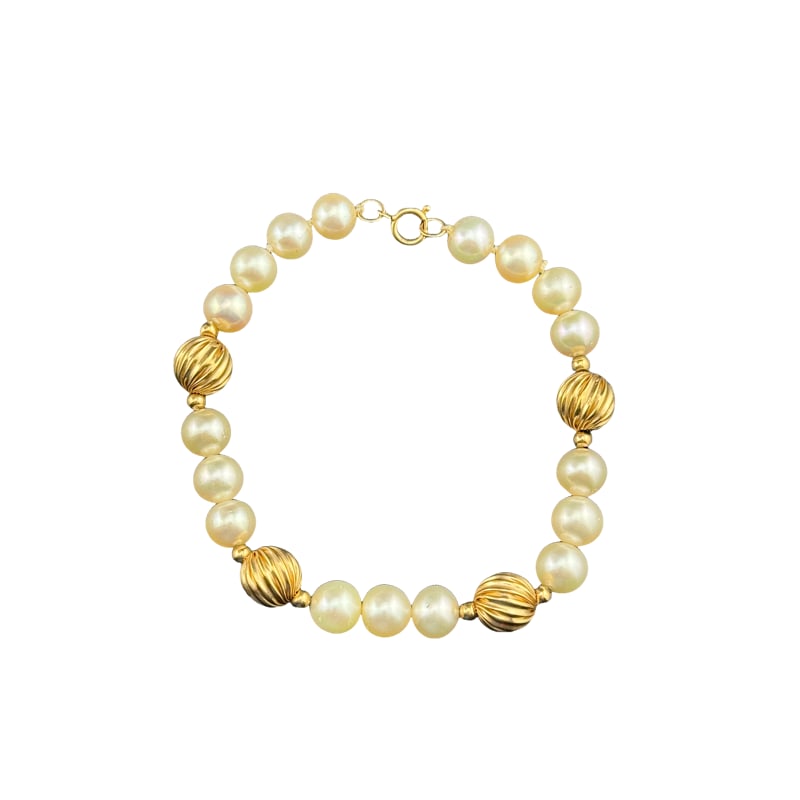 14K Gold and Pearl Bracelet: PLEASE READ: in house shipping If you win this item, please select self arranged for in house shipping when paying invoice Bracelet: 7" pearl: 7.30mm 10.7 grams