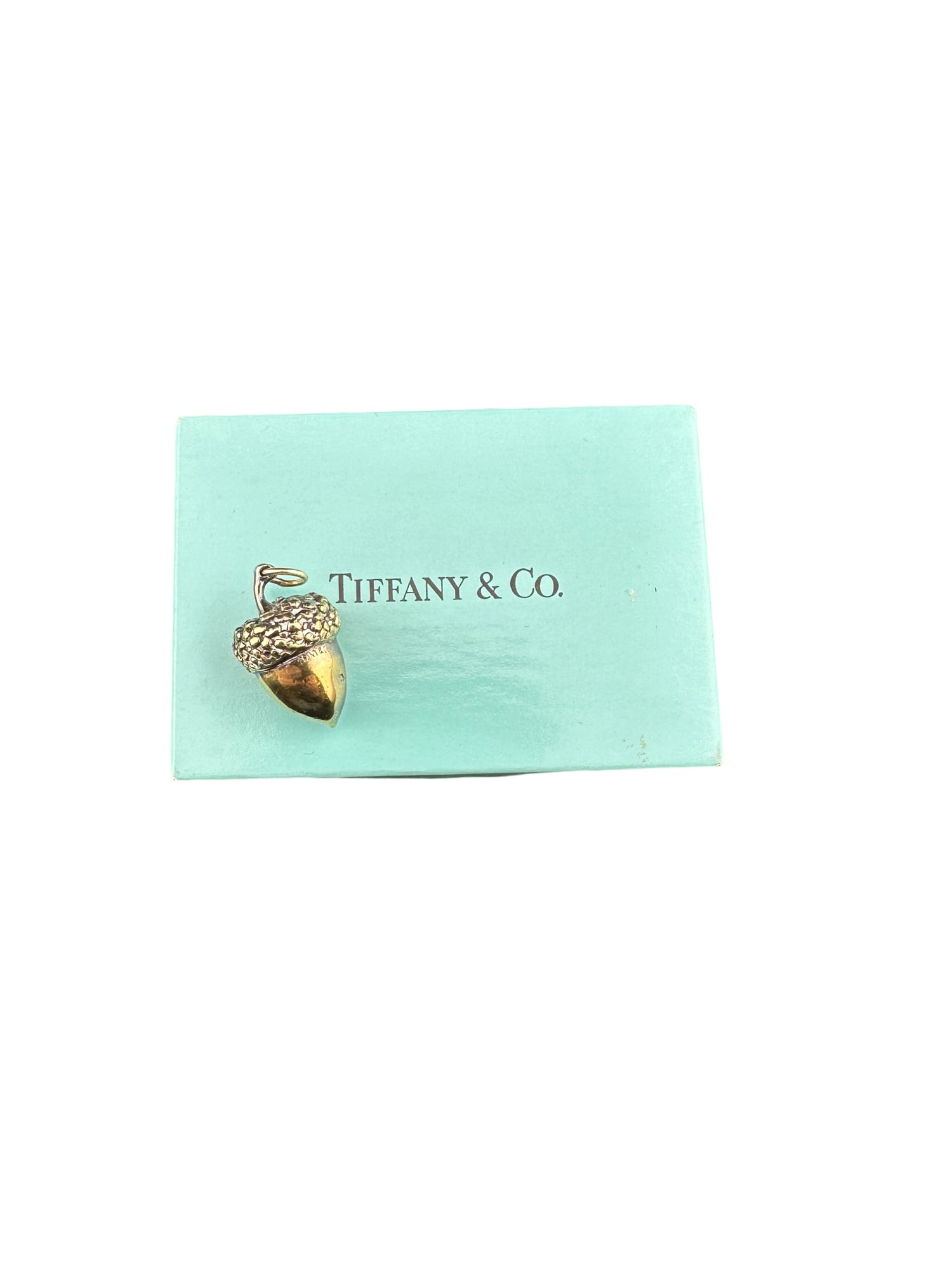 Tiffany & Co. Acorn Pendant gold tone Sterling Silver 925: Tiffany & Co. Acorn Pendant Sterling Silver 925 18.70g 1"with stem PLEASE READ: in house shipping within the US If you win this item, please select self arranged for in house shipping when paying invo