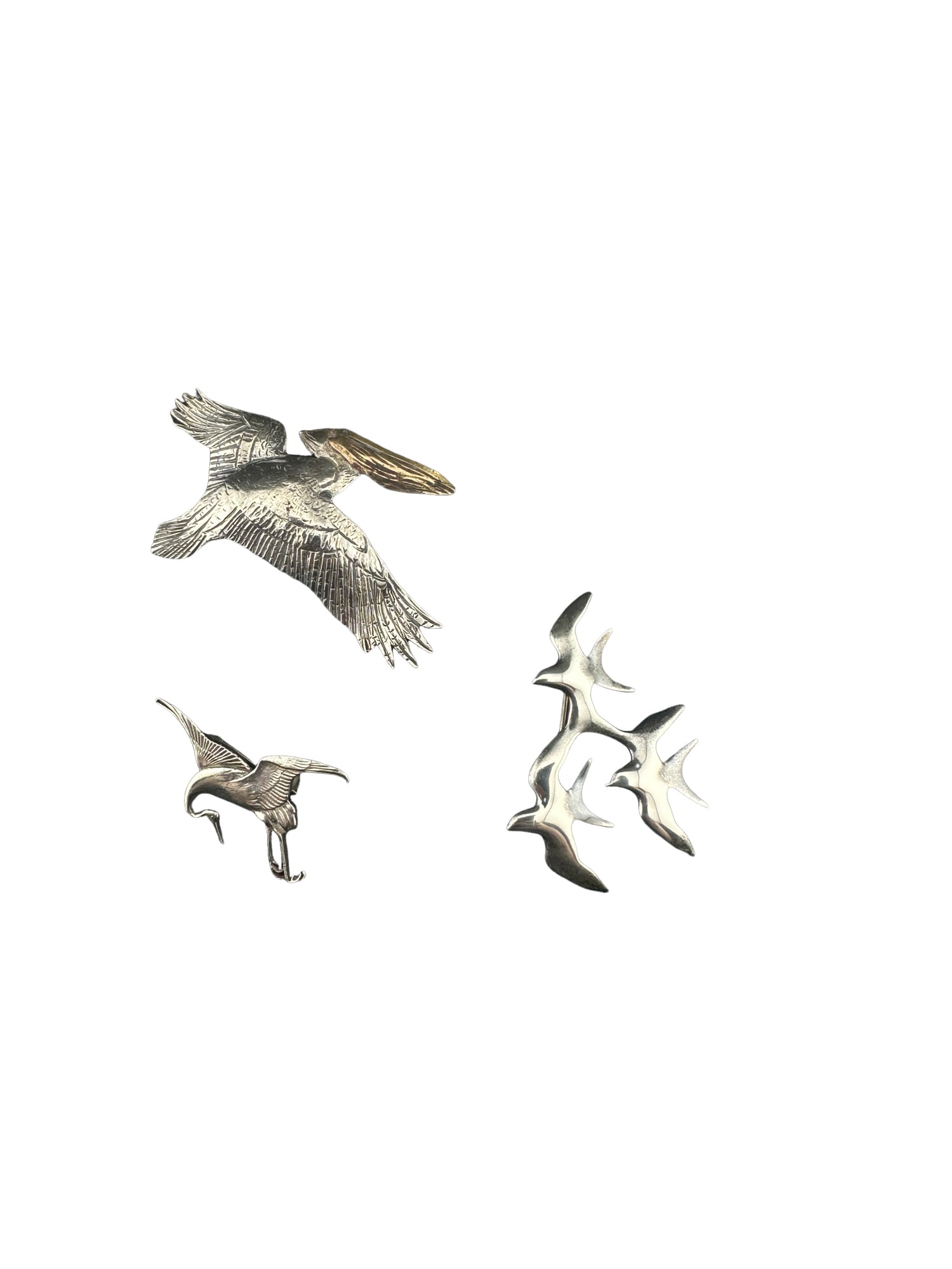 lot of sterling bird pins/brooch: PLEASE READ: in house shipping within the US If you win this item, please select self arranged for in house shipping when paying invoice heron marked Sterling. The pelican is signed Courtney 