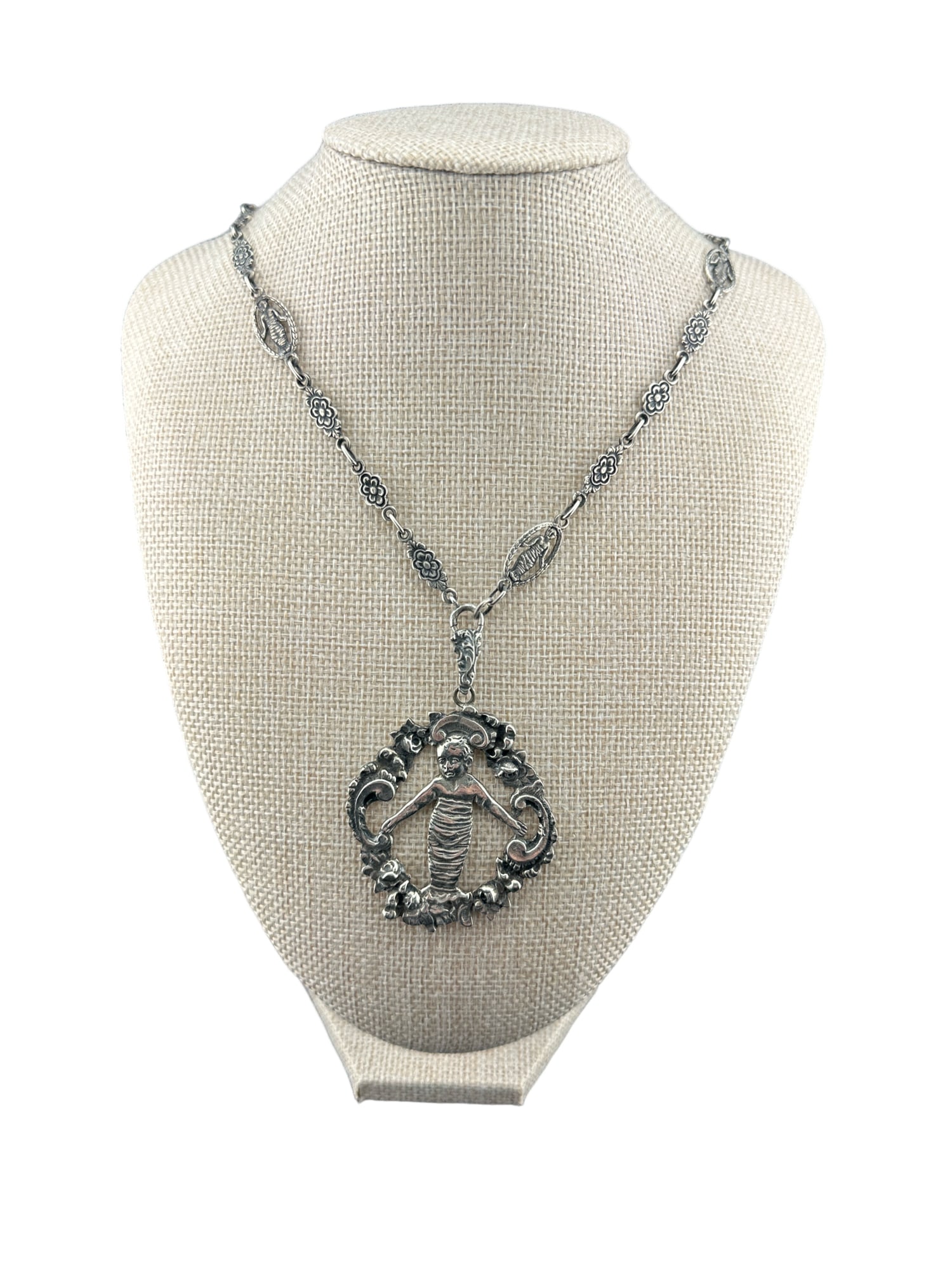 Vintage 800 sterling silver Della Robbia Swaddled Infant baby pendant on chain: in house shipping within the US If you win this item, please select self arranged for in house shipping when paying invoice Vintage 800 sterling silverDella Robbia Swaddled Infant baby pendant on