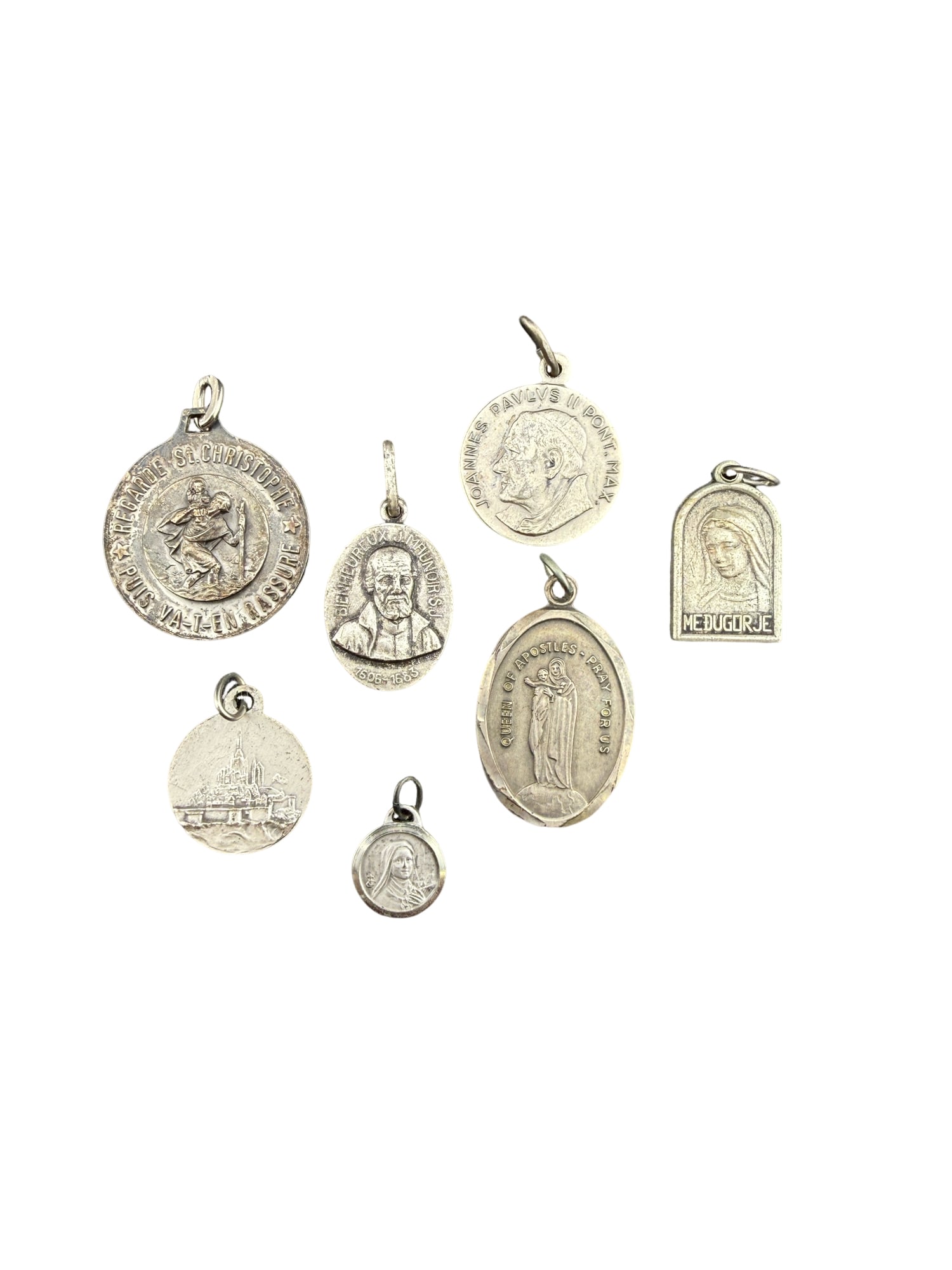 Lot of Silver Toned Religious Medal Pendants: PLEASE READ: in house shipping within the US If you win this item, please select self arranged for in house shipping when paying invoice Lot of Silver Toned Religious Medal Pendants Smallest: 0.25"