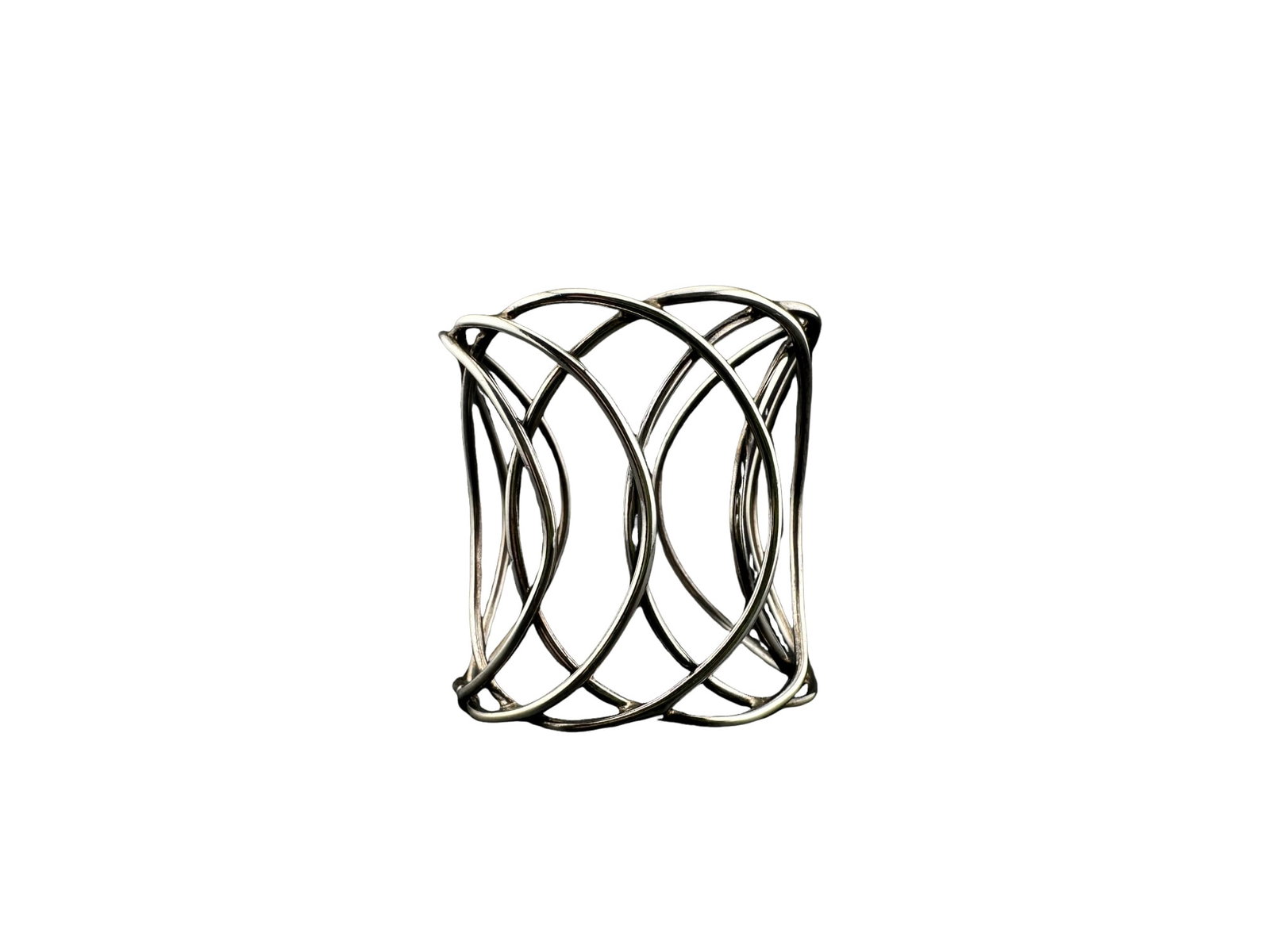 Large Mexican Sterling Silver Cascading Circle Wire Cuff Bracelet: PLEASE READ:in house shipping within the US If you win this item, please select self arranged for in house shipping when paying invoice Sculptural Mexican sterling silver cuff bracelet featuring an op